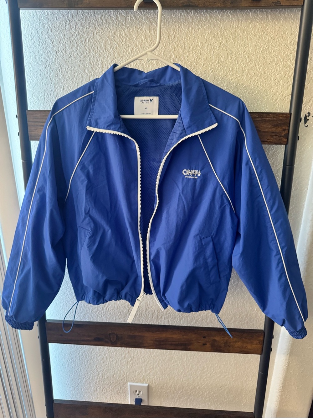 Old Navy Royal Blue cropped windbreaker jacket with White Piping.